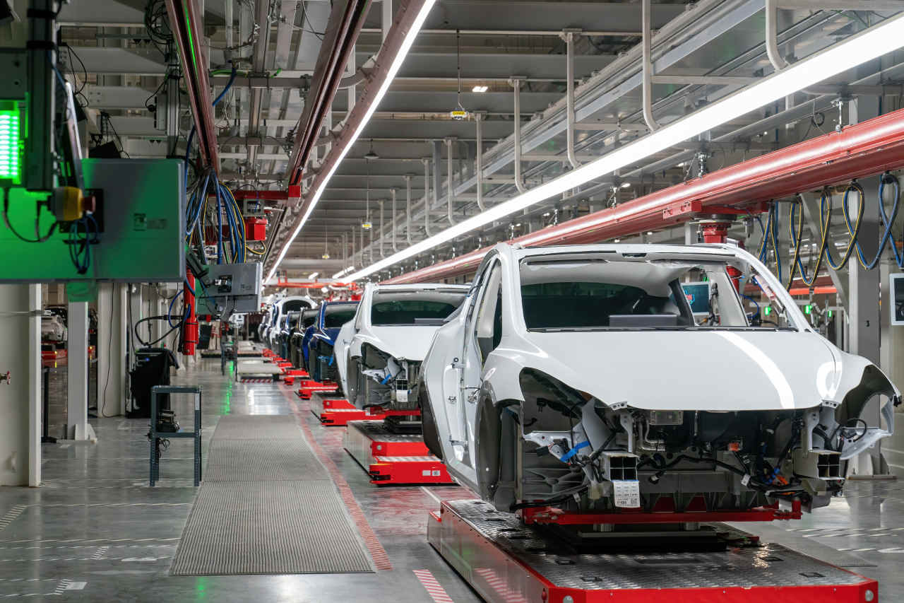Why EVs are still so expensive that they’re driving up the cost of all new cars